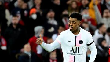 Paris Saint-Germain's French defender Presnel Kimpembe celebrates after scoring a goal during the French L1 football match between Lille and Paris Saint-Germain at the Pierre-Mauroy stadium in Villeneuve-d'Ascq, near Lille, on February 6, 2022. (Photo by DENIS CHARLET / AFP)