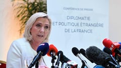 French far-right Rassemblement National (RN) party Member of Parliament and presidential candidate Marine Le Pen holds a press conference on diplomacy and foreign policy in Paris on April 13, 2022, ahead of the second round of France&#039;s presidential e