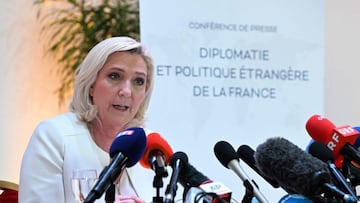 French far-right Rassemblement National (RN) party Member of Parliament and presidential candidate Marine Le Pen holds a press conference on diplomacy and foreign policy in Paris on April 13, 2022, ahead of the second round of France&#039;s presidential e