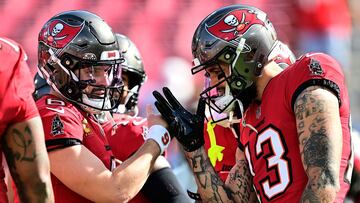 TAMPA, FLORIDA - JANUARY 05: Baker Mayfield #6 and Mike Evans #13 of the Tampa Bay Buccaneers prepare for the game against the New Orleans Saints at Raymond James Stadium on January 05, 2025 in Tampa, Florida. Julio Aguilar/Getty Images/AFP (Photo by Julio Aguilar / GETTY IMAGES NORTH AMERICA / Getty Images via AFP)