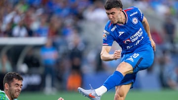 Jul 31, 2025; Seattle, Washington, USA; Cruz Azul midfielder Jose Paradela (20) shoots the ball against Seattle Sounders defender Jackson Ragen (25) during the second half at Lumen Field. Mandatory Credit: Stephen Brashear-Imagn Images