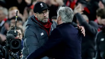Soccer Football - FA Cup - Third Round - Liverpool v Everton - Anfield, Liverpool, Britain - January 5, 2020 Liverpool manager Juergen Klopp hugs Everton manager Carlo Ancelotti after the match Action Images via Reuters/Carl Recine