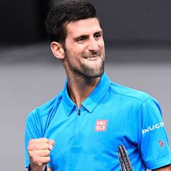 Djokovic through in Paris after Dimitrov scare