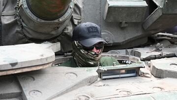 A fighter of Wagner private mercenary group looks out of a tank near the headquarters of the Southern Military District in the city of Rostov-on-Don, Russia, June 24, 2023. REUTERS/Stringer
