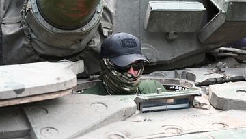 A fighter of Wagner private mercenary group looks out of a tank near the headquarters of the Southern Military District in the city of Rostov-on-Don, Russia, June 24, 2023. REUTERS/Stringer
