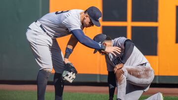 SEATTLE, WA - SEPTEMBER 19: Centerfielder Aaron Judge #99 of the New Yankees checks on right fielder Juan Soto #22 who collided with the wall in the seventh inning at T-Mobile Park on September 19, 2024 in Seattle, Washington. Stephen Brashear/Getty Images/AFP (Photo by STEPHEN BRASHEAR / GETTY IMAGES NORTH AMERICA / Getty Images via AFP)