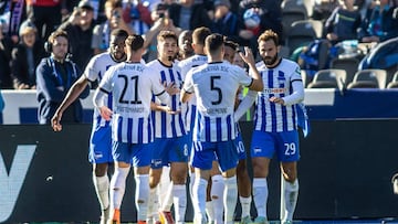 02 October 2022, Berlin: Soccer: Bundesliga, Hertha BSC - TSG 1899 Hoffenheim, Matchday 8, Olympiastadion. Hertha's players cheer after Lukebakio's equalizer to make it 1:1. Photo: Andreas Gora/dpa - IMPORTANT NOTE: In accordance with the requirements of the DFL Deutsche Fußball Liga and the DFB Deutscher Fußball-Bund, it is prohibited to use or have used photographs taken in the stadium and/or of the match in the form of sequence pictures and/or video-like photo series. (Photo by Andreas Gora/picture alliance via Getty Images)