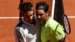 Roger Federer y Rafa Nadal se saludan tras su partido de semifinales de Roland Garros 2019.