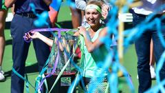 Elena Vesnina of Russia smiles amid the confetti during the trophy presentation following victory over compatriot Svetlana Kuznetsova in the women&#039;s singles final at the WTA Indian Wells Masters in Indian Wells, California on March 19, 2017.
 Vesnina defeated Kuznetsova 6-7 (6/8), 7-5, 6-4. / AFP PHOTO / FREDERIC J. BROWN