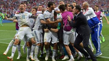 Moscow (Russian Federation), 01/07/2018.- Players of Russia react after winning the FIFA World Cup 2018 round of 16 soccer match between Spain and Russia in Moscow, Russia, 01 July 2018.
(RESTRICTIONS APPLY: Editorial Use Only, not used in association with any commercial entity - Images must not be used in any form of alert service or push service of any kind including via mobile alert services, downloads to mobile devices or MMS messaging - Images must appear as still images and must not emulate match action video footage - No alteration is made to, and no text or image is superimposed over, any published image which: (a) intentionally obscures or removes a sponsor identification image; or (b) adds or overlays the commercial identification of any third party which is not officially associated with the FIFA World Cup) (España, Mundial de Fútbol, Moscú, Rusia) EFE/EPA/SERGEI CHIRIKOV EDITORIAL USE ONLY EPA-EFE/SERGEI CHIRIKOV EDITORIAL USE ONLY EDITORIAL USE ONLY