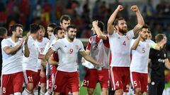 Georgia players celebrate their 1-0 victory at the end of the EURO 2016 friendly football match Spain vs Georgia at the Coliseum Alfonso Perez stadium in Getafe, on June 7, 2016, in preparation for the upcoming Euro 2016 European football championship. / 