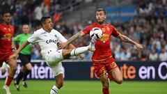 Marseille's Chilean forward Alexis Sanchez (L) vies for the ball with Angers' Slovenian defender Miha Blazic during the French L1 football match between Olympique Marseille (OM) and SCO Angers at Stade Velodrome in Marseille, southern France on May 14, 2023. (Photo by Nicolas TUCAT / AFP)