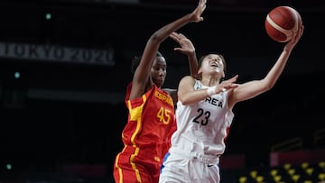 South Korea&#039;s Danbi Kim (23), right, drives to the basket past Spain&#039;s Astou Ndour (45) during women&#039;s basketball preliminary round game at the 2020 Summer Olympics, Monday, July 26, 2021, in Saitama, Japan. (AP Photo/Charlie Neibergall)