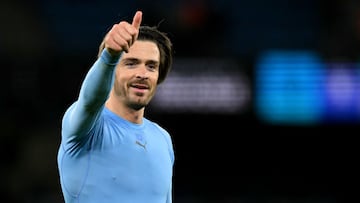 Manchester City's English midfielder #10 Jack Grealish reacts following the English FA Cup fifth round football match between Manchester City and Plymouth Argyle at the Etihad Stadium in Manchester, north west England, on March 1, 2025. (Photo by Oli SCARFF / AFP) / RESTRICTED TO EDITORIAL USE. No use with unauthorized audio, video, data, fixture lists, club/league logos or 'live' services. Online in-match use limited to 120 images. An additional 40 images may be used in extra time. No video emulation. Social media in-match use limited to 120 images. An additional 40 images may be used in extra time. No use in betting publications, games or single club/league/player publications. /