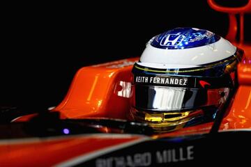 Spain's Fernando Alonso in his McLaren Honda prepares in the garage ahead of practice for the Abu Dhabi Formula One Grand Prix at the Yas Marina Circuit.