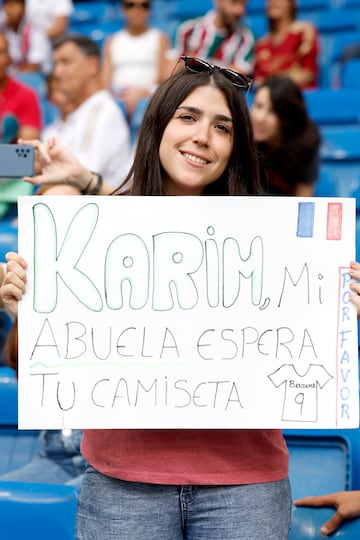 One of many Real Madrid fans hoping to get Benzema's final game shirt.