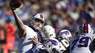 Nov 19, 2017; Carson, CA, USA; Buffalo Bills quarterback Nathan Peterman (2) throws an interception as he his hit by Los Angeles Chargers defensive end Joey Bosa (99) during the second quarter at StubHub Center. Mandatory Credit: Kelvin Kuo-USA TODAY Sports
