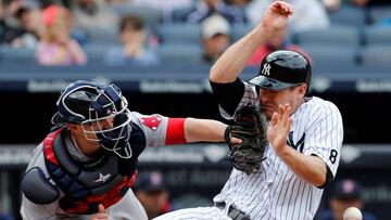 May 7, 2016; Bronx, NY, USA; New York Yankees third baseman Chase Headley (12) is safe after beating the throw to Boston Red Sox catcher Christian Vazquez (7) in the eighth inning at Yankee Stadium. Mandatory Credit: Noah K. Murray-USA TODAY Sports TPX IMAGES OF THE DAY