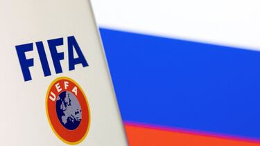 FIFA and UEFA logos are displayed in front of the Russian flag in this illustration taken, February 28, 2022. REUTERS/Dado Ruvic/Illustration