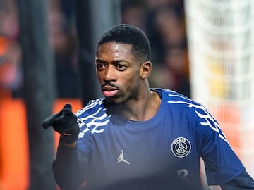 Paris Saint-Germain's French forward #10 Ousmane Dembele celebrates after scoring his team's third goal during the UEFA Champions League knockout phase play-off 1st leg football match between Stade Brestois 29 (Brest) and Paris Saint-Germain (PSG) at the Roudourou Stadium in Guingamp, western France, on February 11, 2025. (Photo by FRED TANNEAU / AFP)