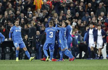 Valencia and Getafe players were involved in a brawl at the end of their Copa del Rey match that saw Valencia score twice in 45 seconds to go through.