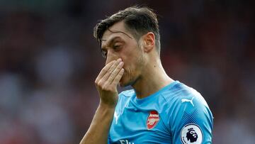 Football Soccer - Premier League - Liverpool vs Arsenal - Liverpool, Britain - August 27, 2017   Arsenal&#039;s Mesut Ozil looks dejected after Liverpool&#039;s Daniel Sturridge scores their fourth goal    Action Images via Reuters/Carl Recine     EDITORIAL USE ONLY. No use with unauthorized audio, video, data, fixture lists, club/league logos or &quot;live&quot; services. Online in-match use limited to 45 images, no video emulation. No use in betting, games or single club/league/player publications. Please contact your account representative for further details.