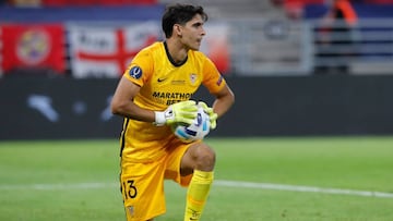 Sevilla's Moroccan goalkeeper Yassine Bounou secures the ball during the UEFA Super Cup football match between FC Bayern Munich and Sevilla FC at the Puskas Arena in Budapest, Hungary on September 24, 2020. (Photo by BERNADETT SZABO / POOL / AFP)