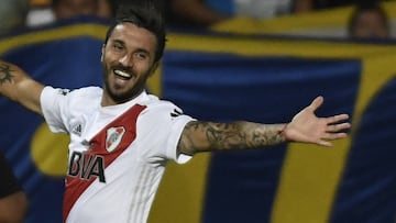 Argentina's River Plate player Ignacio Scocco celebrates after scoring his second goal against Boca Juniors during their Supercopa Argentina 2018 final football match at Malvinas Argentinas stadium in Mendoza, Argentina, on March 14, 2018. / AFP PHOTO / Andres Larrovere