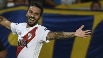 Argentina&#039;s River Plate player Ignacio Scocco celebrates after scoring his second goal against Boca Juniors during their Supercopa Argentina 2018 final football match at Malvinas Argentinas stadium in Mendoza, Argentina, on March 14, 2018. / AFP PHOTO / Andres Larrovere