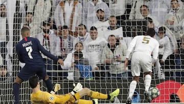 PSG's Kylian Mbappe scores his side's first goal during a Champions League soccer match Group A between Real Madrid and Paris Saint Germain at the Santiago Bernabeu stadium in Madrid, Spain, Tuesday, Nov. 26, 2019. (AP Photo/Bernat Armangue)