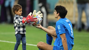 DOHA, QATAR - DECEMBER 10:  Bono of Morocco plays with his son at the end of the FIFA World Cup Qatar 2022 quarter final match between Morocco and Portugal at Al Thumama Stadium on December 10, 2022 in Doha, Qatar. (Photo by Youssef Loulidi/Fantasista/Getty Images)