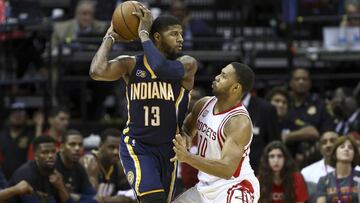 Feb 27, 2017; Houston, TX, USA; Indiana Pacers forward Paul George (13) controls the ball as Houston Rockets guard Eric Gordon (10) defends during the second quarter at Toyota Center. Mandatory Credit: Troy Taormina-USA TODAY Sports