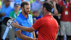 AUSTIN, TX - MARCH 26: Dustin Johnson (L) shakes hands with Jon Rahm of Spain after winning the final match of the World Golf Championships-Dell Technologies Match Play 1 up on the 18th hole at the Austin Country Club on March 26, 2017 in Austin, Texas.   Richard Heathcote/Getty Images/AFP
 == FOR NEWSPAPERS, INTERNET, TELCOS &amp; TELEVISION USE ONLY ==