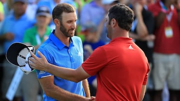 AUSTIN, TX - MARCH 26: Dustin Johnson (L) shakes hands with Jon Rahm of Spain after winning the final match of the World Golf Championships-Dell Technologies Match Play 1 up on the 18th hole at the Austin Country Club on March 26, 2017 in Austin, Texas. Richard Heathcote/Getty Images/AFP
== FOR NEWSPAPERS, INTERNET, TELCOS & TELEVISION USE ONLY ==