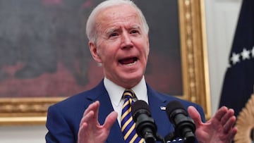 US President Joe Biden speaks about the Covid-19 response before signing executive orders for economic relief to Covid-hit families and businesses in the State Dining Room of the White House in Washington, DC, on January 22, 2021. (Photo by Nicholas Kamm 