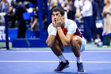 Spain's Carlos Alcaraz celebrates his win against Italy's Jannik Sinner during their 2022 US Open Tennis tournament men's singles quarter-final match against  at the USTA Billie Jean King National Tennis Center in New York, on early September 8, 2022. (Photo by Corey Sipkin / AFP)