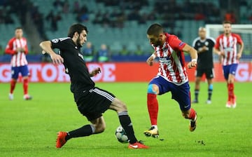 Soccer Football - Champions League - Qarabag FK vs Atletico Madrid - Olympic Stadium, Baku, Azerbaijan - October 18, 2017 Qarabag’s Badavi Huseynov in action with Atletico Madrid's Yannick Carrasco