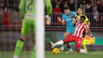 Athletic Bilbao's Spanish defender #18 Oscar De Marcos (L) fights for the ball with Almeria's Belgian forward #07 Largie Ramazani during the Spanish league football match between UD Almeria and Athletic Club Bilbao at the Municipal Stadium of the Mediterranean Games in Almeria on February 12, 2024. (Photo by JORGE GUERRERO / AFP)