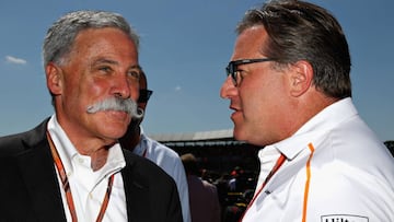 NORTHAMPTON, ENGLAND - JULY 08: Chase Carey, CEO and Executive Chairman of the Formula One Group, talks with McLaren Chief Executive Officer Zak Brown on the grid before the Formula One Grand Prix of Great Britain at Silverstone on July 8, 2018 in Northampton, England.  (Photo by Mark Thompson/Getty Images)