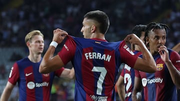Barcelona's Spanish forward #07 Ferran Torres celebrates scoring his team's second goal during the Spanish Liga football match between FC Barcelona and Cadiz CF at the Lluis Companys Olimpic Stadium in Barcelona on August 20, 2023. (Photo by LLUIS GENE / AFP)