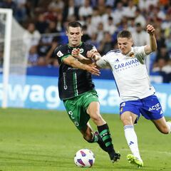 El Racing frena al líder