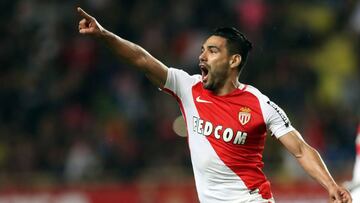 Monaco's Colombian forward Radamel Falcao (C) celebrates after scoring a goal during the French L1 football match Monaco (ASM) vs Dijon (DFCO) on April 15, 2017 at the Louis II Stadium in Monaco. / AFP PHOTO / VALERY HACHE