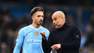 Manchester (United Kingdom), 31/03/2024.- Manchester City's manager Pep Guardiola (R) talks to Manchester City's Jack Grealish (L) after the English Premier League match between Manchester City and Arsenal in Manchester, Britain, 31 March 2024. (Reino Unido) EFE/EPA/PETER POWELL EDITORIAL USE ONLY. No use with unauthorized audio, video, data, fixture lists, club/league logos, 'live' services or NFTs. Online in-match use limited to 120 images, no video emulation. No use in betting, games or single club/league/player publications.