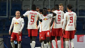 ISTANBUL, TURKEY - DECEMBER 02: Dani Olmo of RB Leipzig celebrates with team mates Amadou Haidara (C), Angelino (L), Dayot Upamecano (2L), Ibrahima Konate, Yussuf Poulsen of RB Leipzig after scoring their sides third goal during the UEFA Champions League 