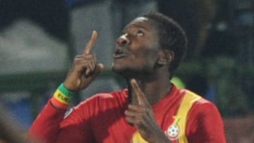 Ghana's striker Asamoah Gyan celebrates after scoring Ghana's second goal during the 2010 World Cup round of 16 football match USA vs. Ghana on June 26, 2010 at Royal Bafokeng stadium in Rustenburg.NO PUSH TO MOBILE / MOBILE USE SOLELY WITHIN ED