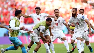 Soccer Football - FIFA World Cup Qatar 2022 - Group B - Wales v Iran - Ahmad Bin Ali Stadium, Al Rayyan, Qatar - November 25, 2022 Iran's Roozbeh Cheshmi celebrates scoring their first goal with teammates REUTERS/Hannah Mckay