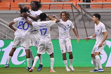 Mathis Amougou (20) celebrates with teammates after scoring a goal during the World Cup U17 qualifying group E match between France and South Korea