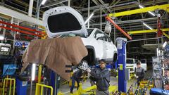 Employees work at the assembly line of the Moscow Automobile Factory Moskvich, after the production of cars under the Soviet-era brand Moskvich at French carmaker Renault's former plant was launched in Moscow, Russia, November 23, 2022. REUTERS/Evgenia Novozhenina