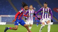LONDON, ENGLAND - DECEMBER 16: Michael Olise of Crystal Palace holds off pressure from Sergio Escudero of Real Valladolid during the friendly match between Crystal Palace and Real Valladolid at Selhurst Park on December 16, 2022 in London, England. (Photo by Clive Rose/Getty Images)