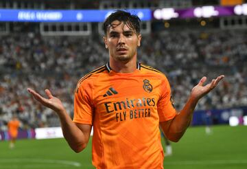 Real Madrid's Spanish forward #21 Brahim Diaz celebrates scoing his team's second goal during the pre-season club friendly football match between Real Madrid and Chelsea at Bank of America Stadium in Charlotte, North Carolina, August 6, 2024. (Photo by Peter Zay / AFP)